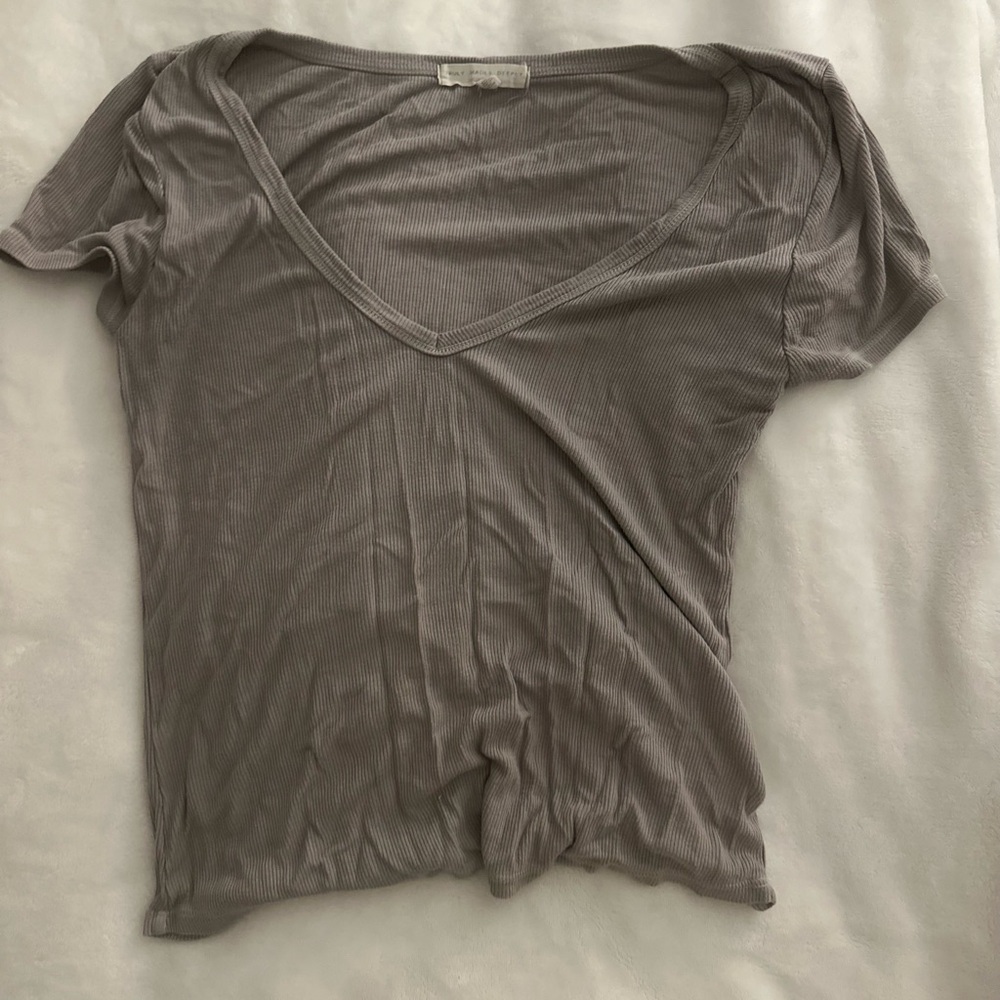 Light purple tee.